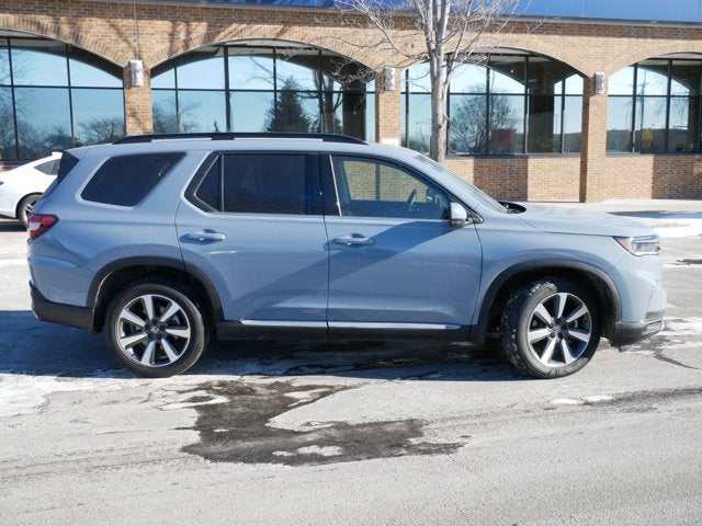 Used 2023 Honda Pilot Touring with VIN 5FNYG1H71PB001675 for sale in Brooklyn Park, Minnesota